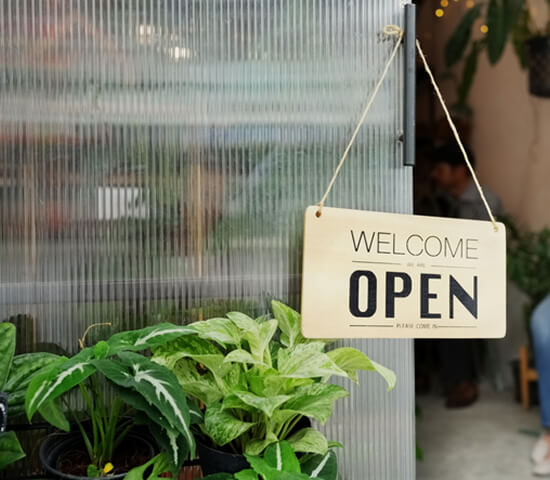 open sign outside of small business