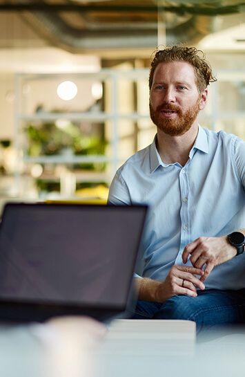 man in conversation at work